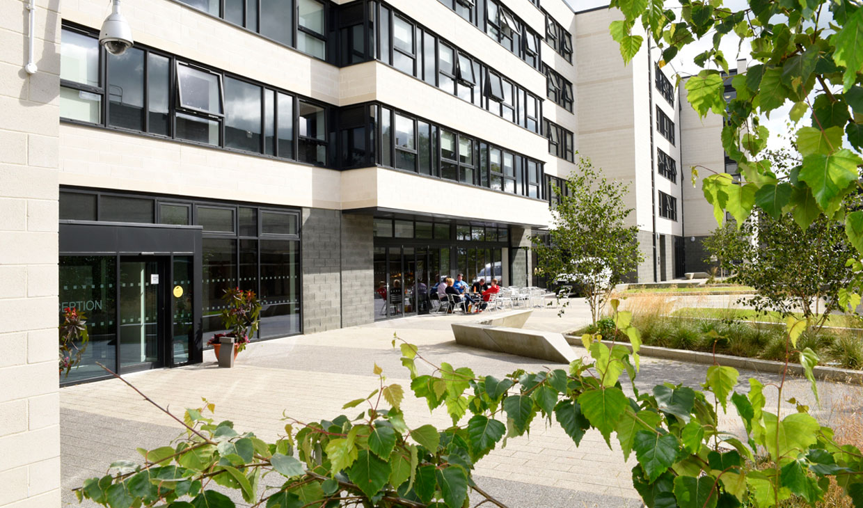 A group of students enjoying a coffee outside at Willow Court