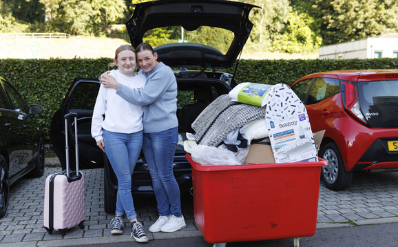 Student and parent arriving at accommodation