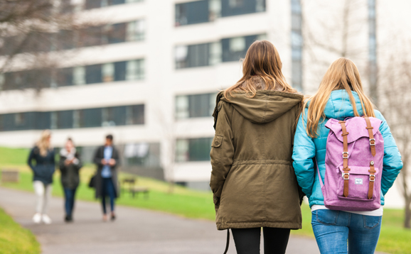 students walking on campus