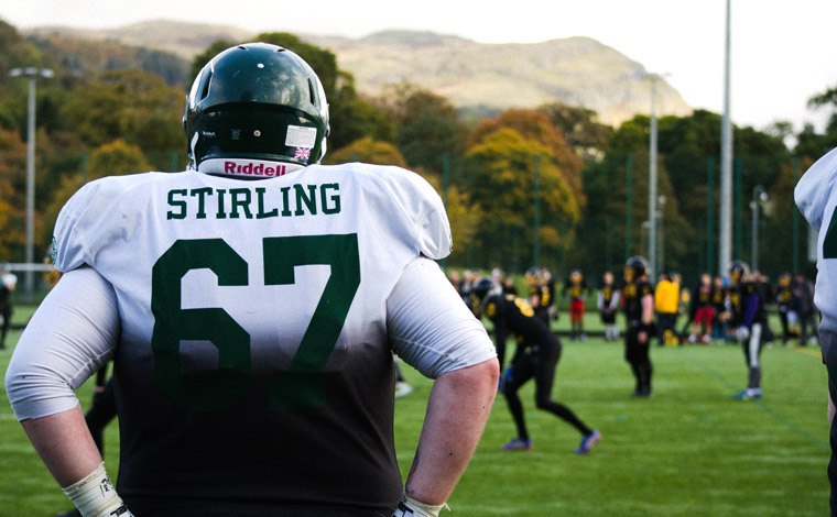 An American footballer looking over to Dumyat Hill