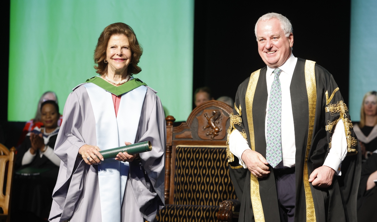 Woman and man at graduation