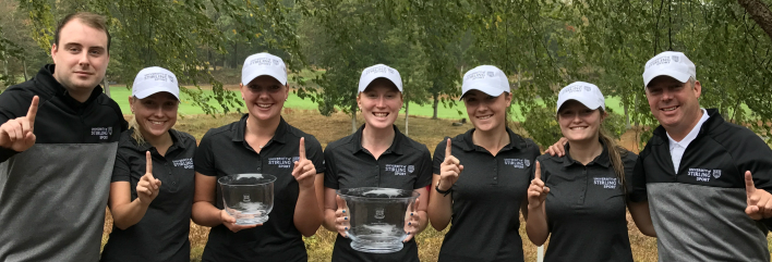 Stirling champions: Chris Purdie (Assistant Coach), Emily Laws, Chloe Goadby, Gemma Batty, Hazel MacGarvie, Mirren Fraser and Dean Robertson (Head Coach) celebrate their win.