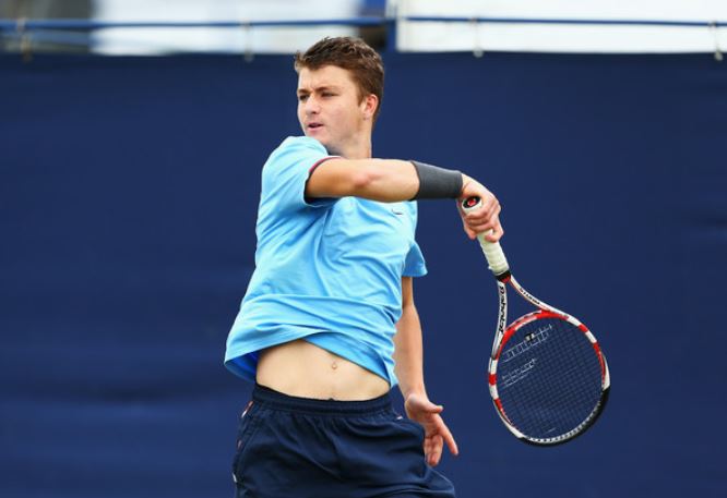 Jonny O'Mara playing Tennis