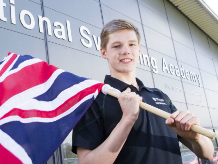 Duncan Scott holding a flag