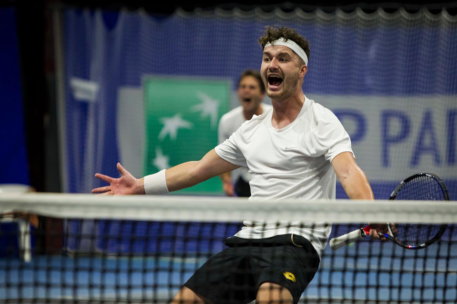 Jonny O'Mara playing tennis