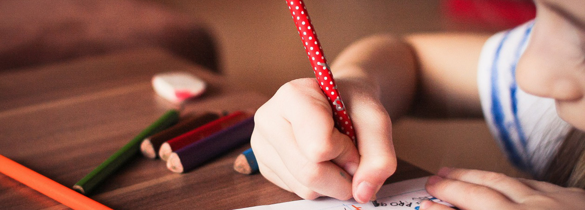 An image of a child drawing