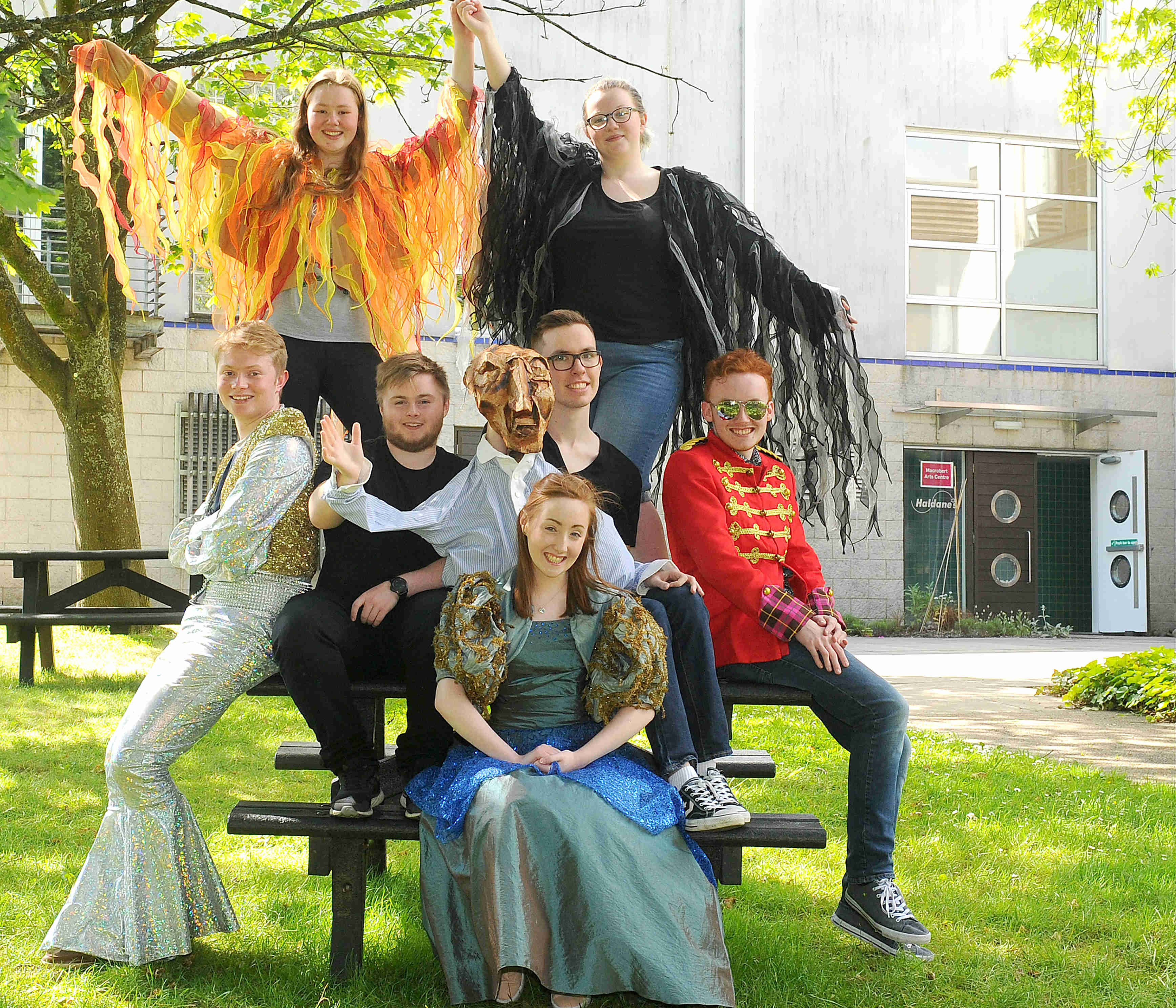 Group of students in stage costumes