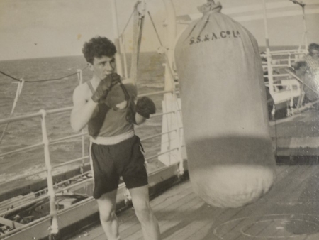 Scottish boxer Hugh Riley training on board the SS Tamora en route to the 1950 Games in Auckland, New Zealand