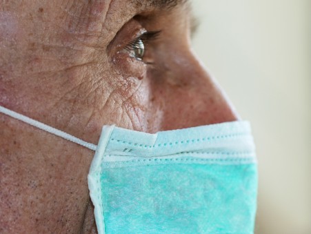 Elderly man wearing mask