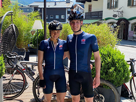 Sophia Green and Cameron Main in front of their bikes.