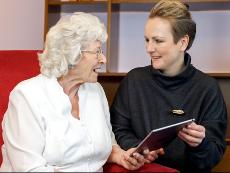 Lesley Palmer talks to an elderly lady