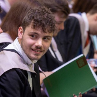 Graduands in graduation hall