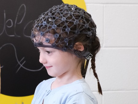 Fiadh Robertson, age 4, wears mobile electroencepholography (EEG) equipment at University of Stirling's Lifespan Lab, the first of its kind in Scotland.