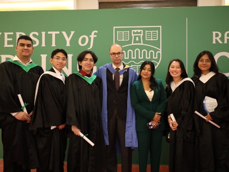 Students at the University of Stirling's UAE campus celebrate their graduation.