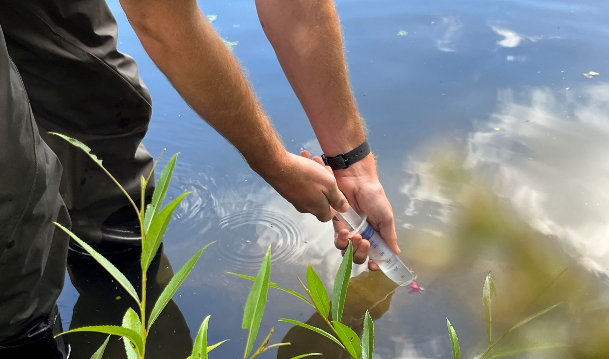 Dr Alan Law using sampling kit at the University of Stirling campus