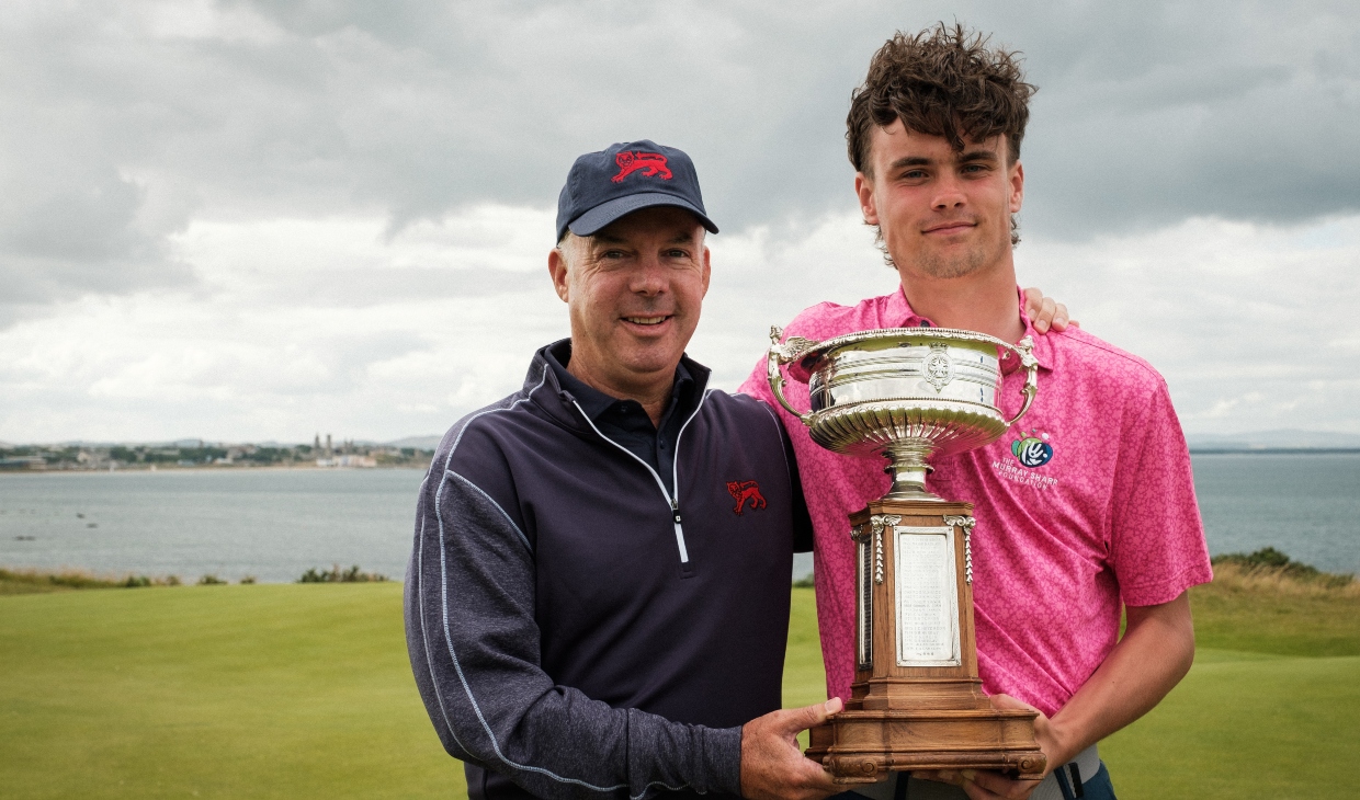 Alexander Farmer with coach Dean Robertson.