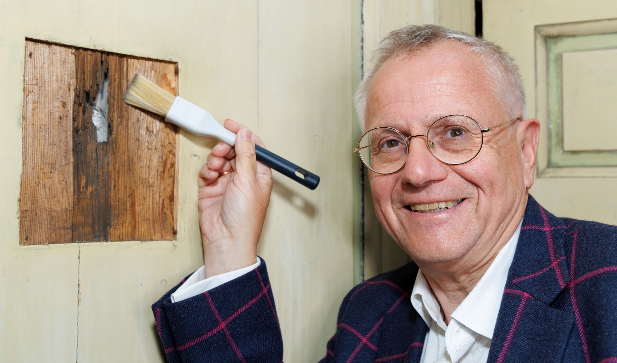 Historian Murray Pittock pictured next to the hole.