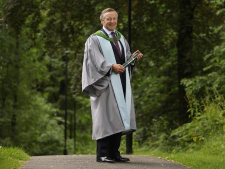 Sandy Manson on the University of Stirling campus, accepting his honorary doctorate.