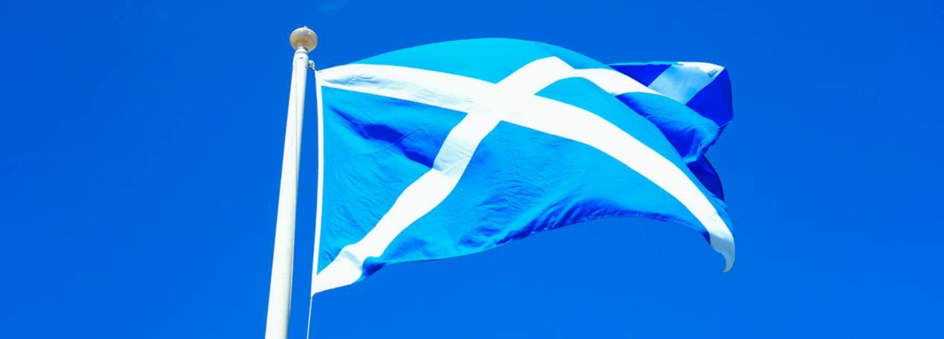 Scotland flag with blue sky