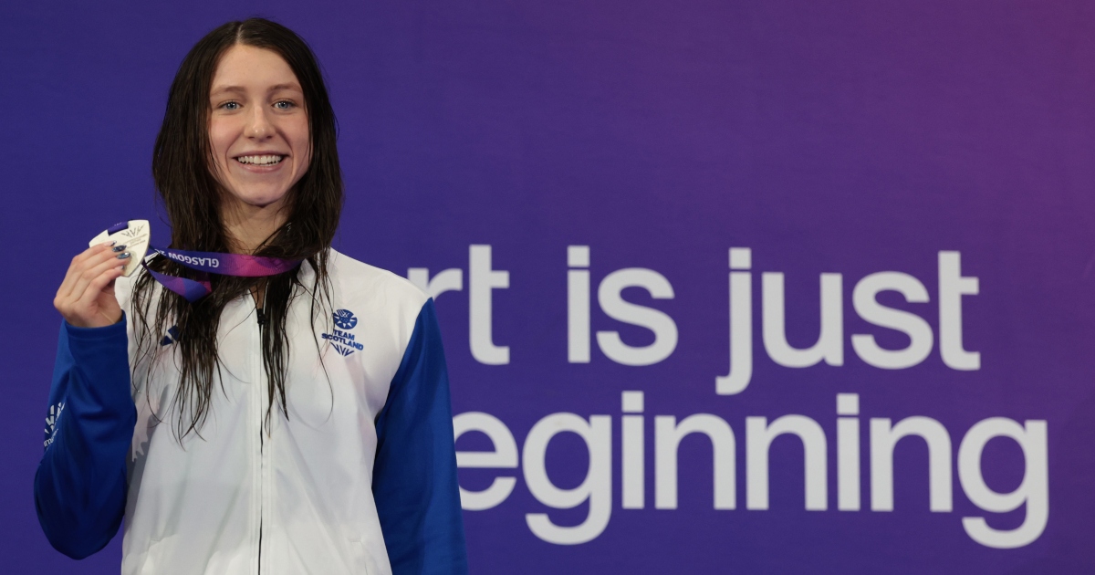 Keanna MacInnes celebrates her Butterfly silver.