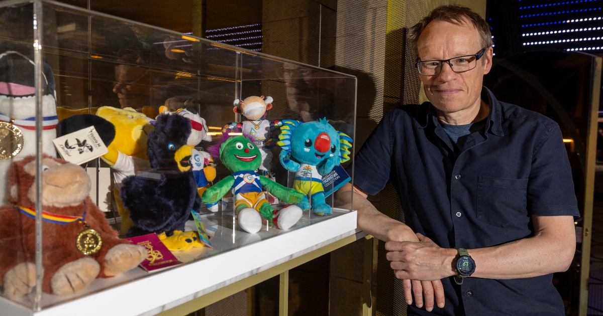 Karl Magee pictured alongside some of the Team Scotland mascots.
