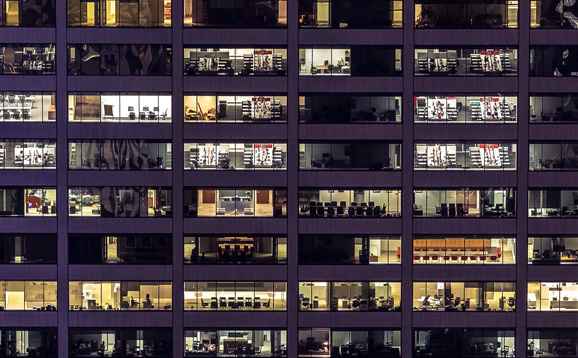 office building lit up at night