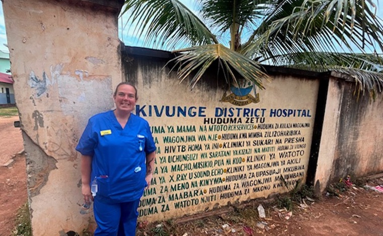 Student nurse outside hospital in Tanzania