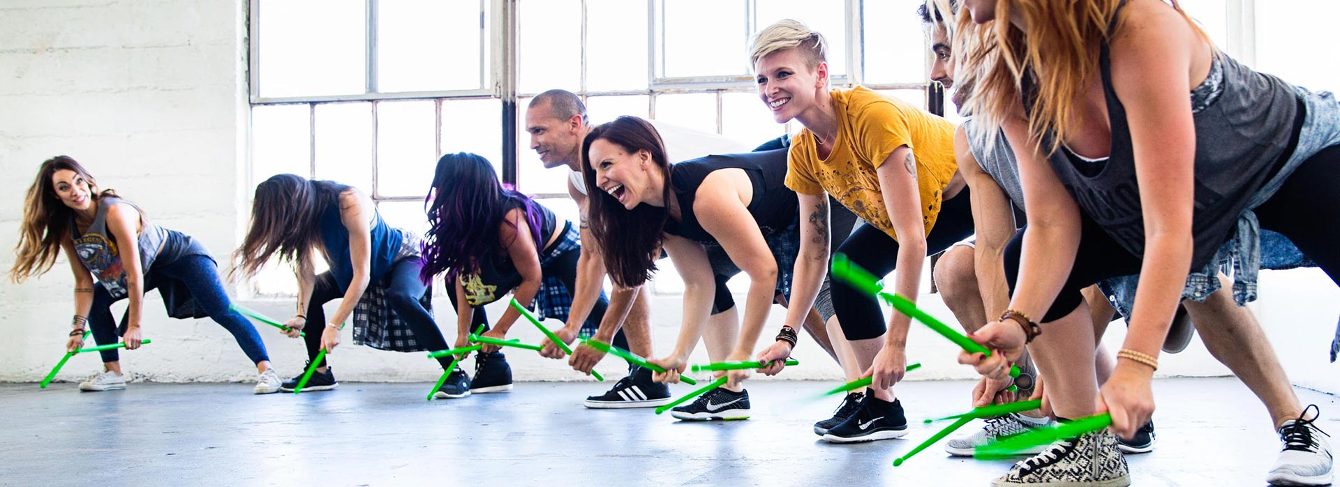 Group of people doing UV Pound exercise